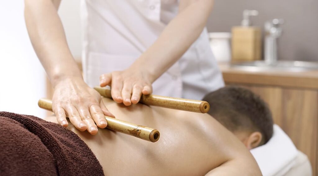 a person receiving a back massage